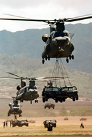CH-47Ds Lifting HMMWVs