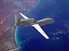 UAV RQ-4 Global Hawk High Over Seashore